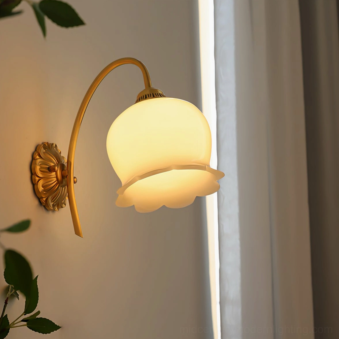 Lily of the valley wall lamp architectural detail showing curved brass arms and central column design