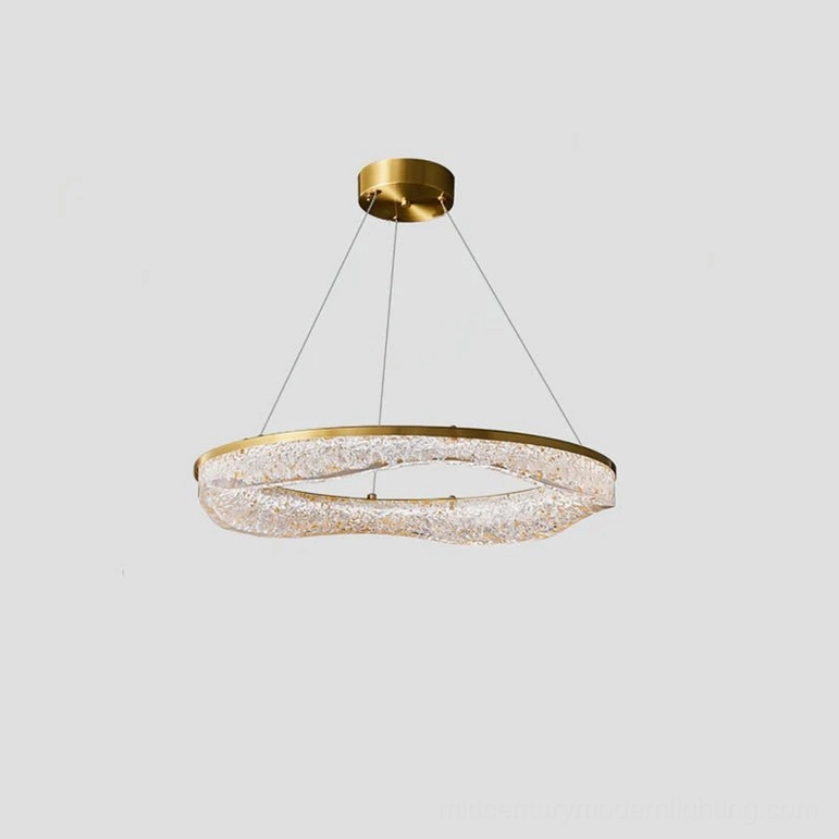 Aria multi-ring chandelier overhead studio photography brass hardware detail