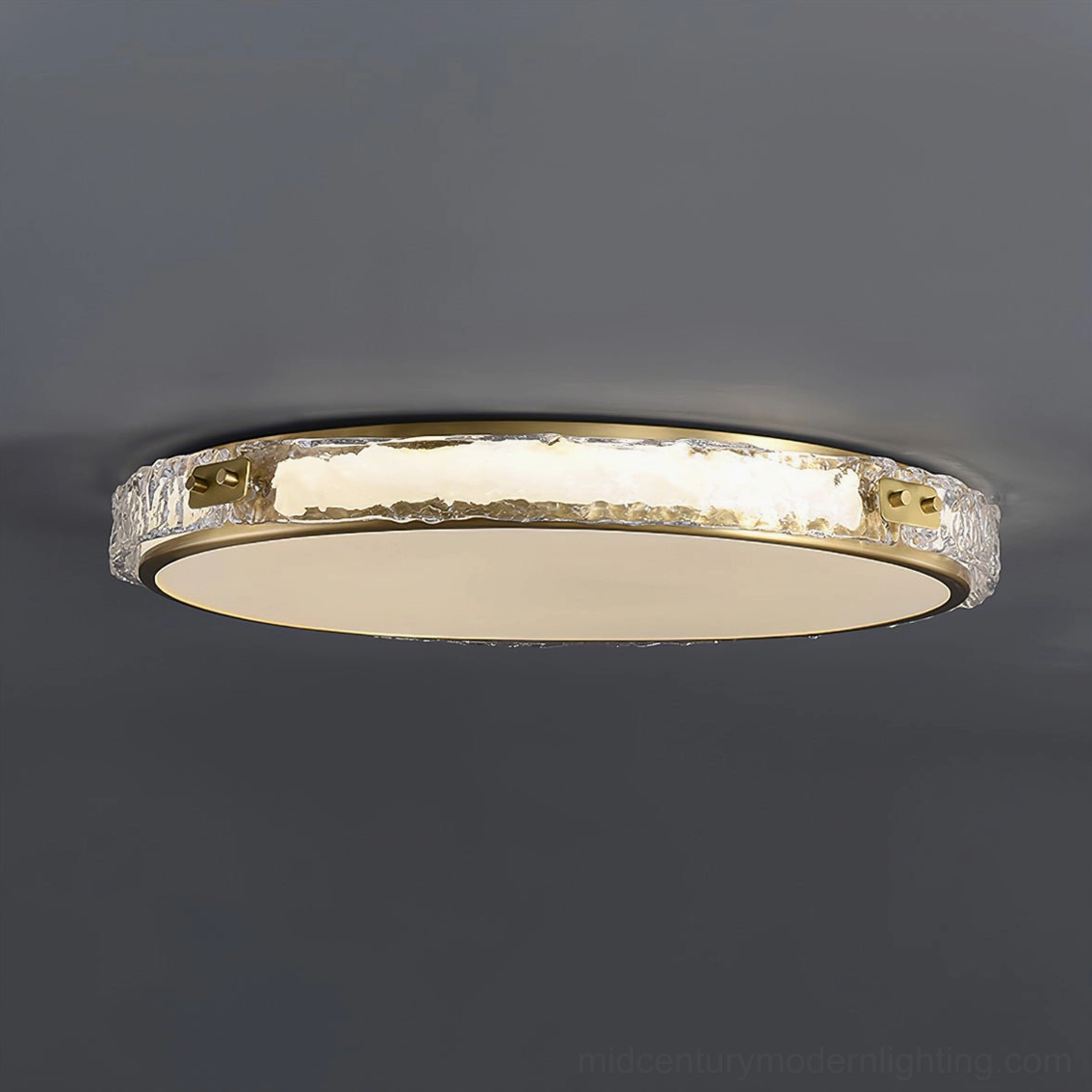 Arlus ceiling fixture detail showing premium brass hardware and textured glass construction