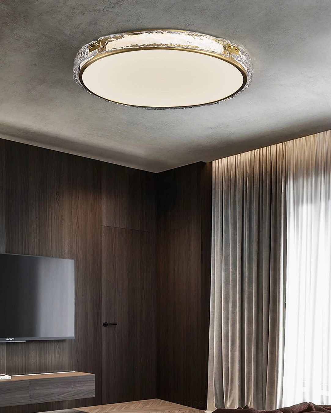 Arlus flush mount ceiling light installed in modern bedroom with TV wall unit and minimalist décor