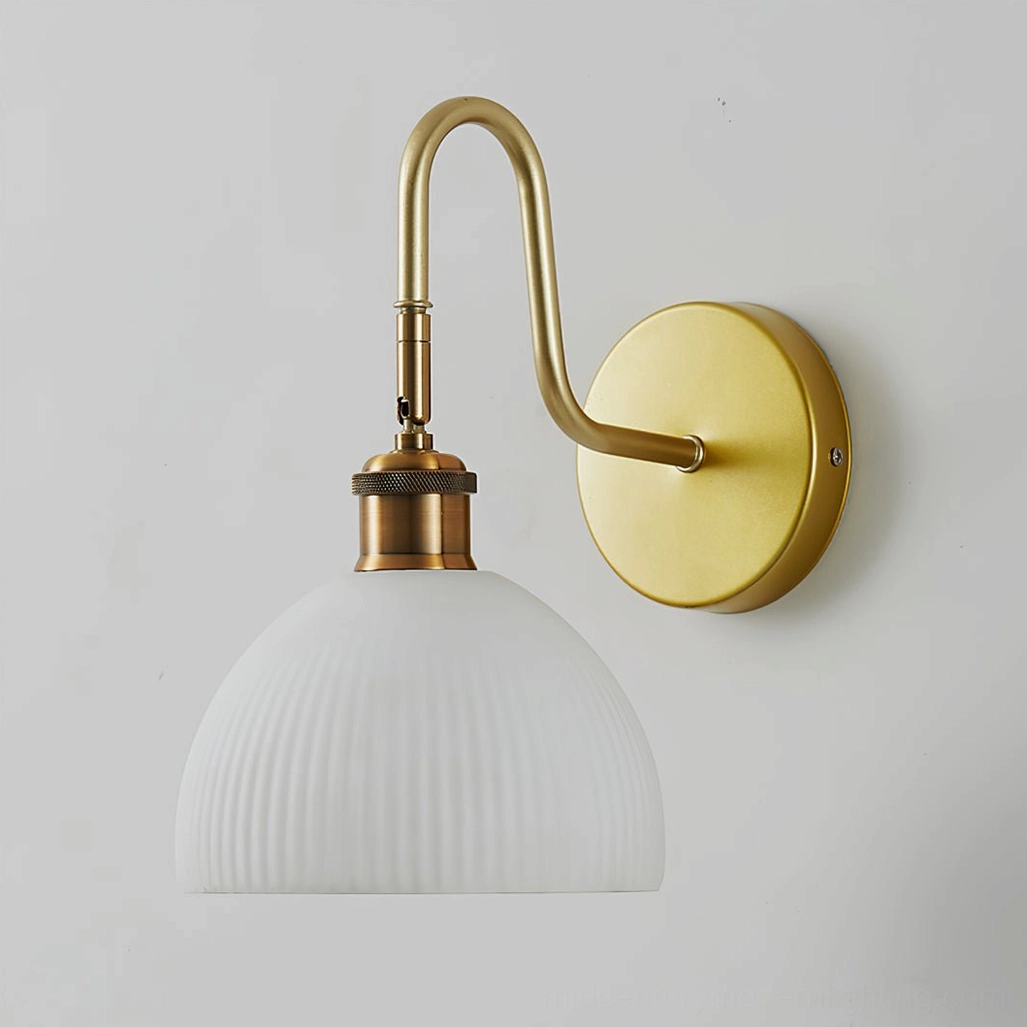 Arren mid-century modern wall sconce paired with contemporary home furnishings and décor styling