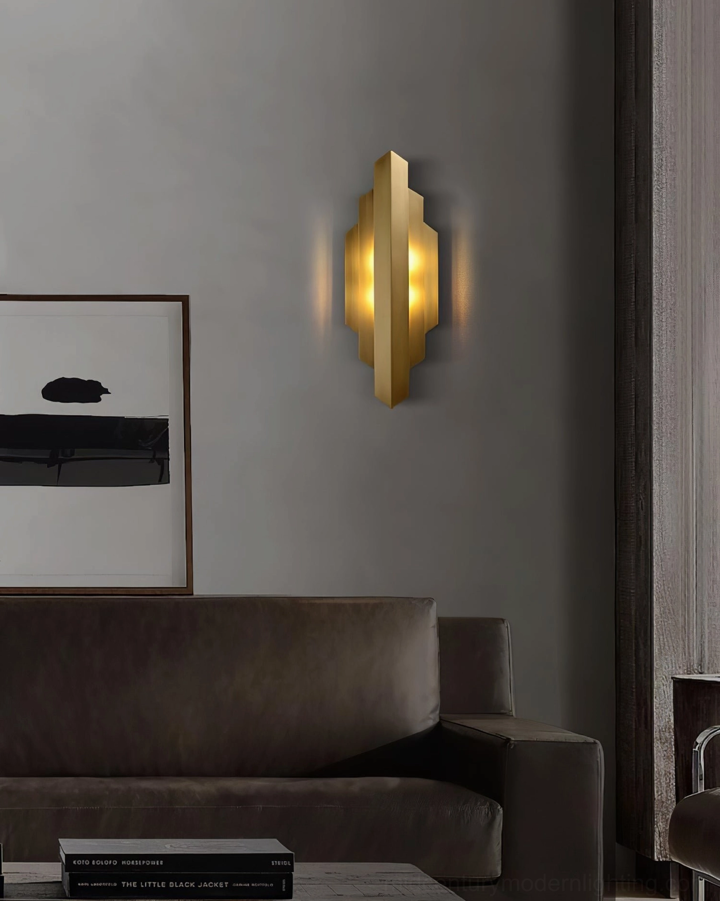 Geometric polished brass Art Deco wall sconce architectural detail shot