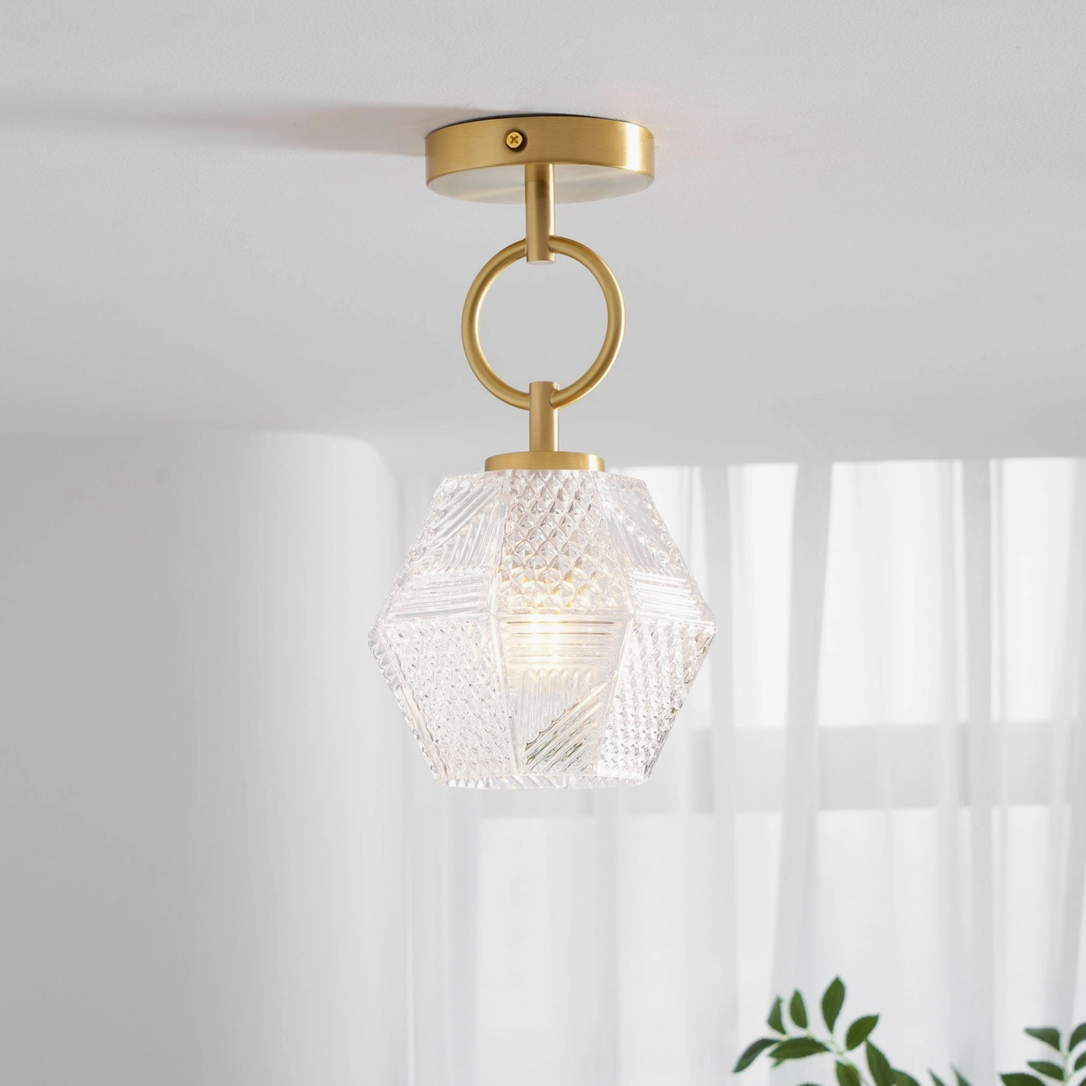 Diamond cut Art Deco ceiling light fixture architectural photography side angle view