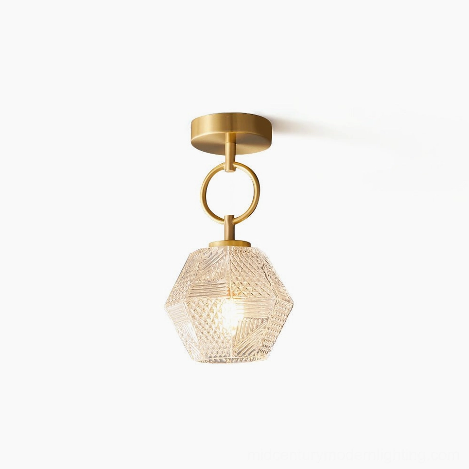 Art Deco diamond cut brass ceiling light with faceted opaque glass shade, front studio view