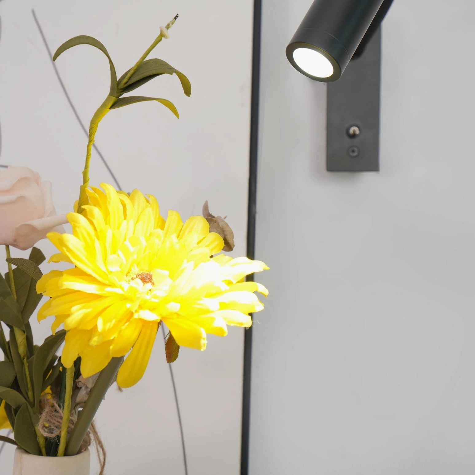 Art deco inspired LED wall sconce modern bedroom lighting, flexible positioning detail