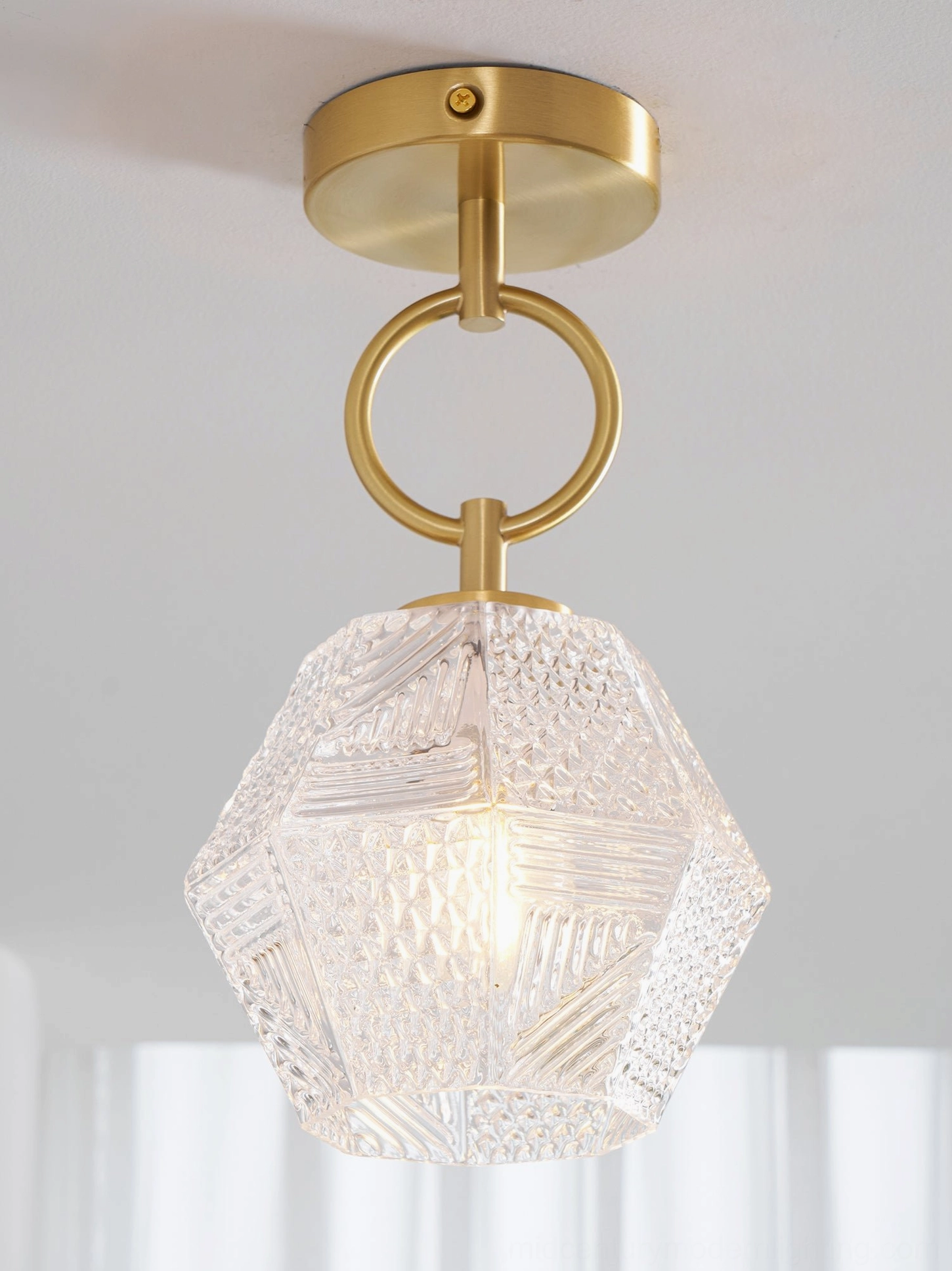 Diamond cut Art Deco ceiling light shade removal for cleaning maintenance care