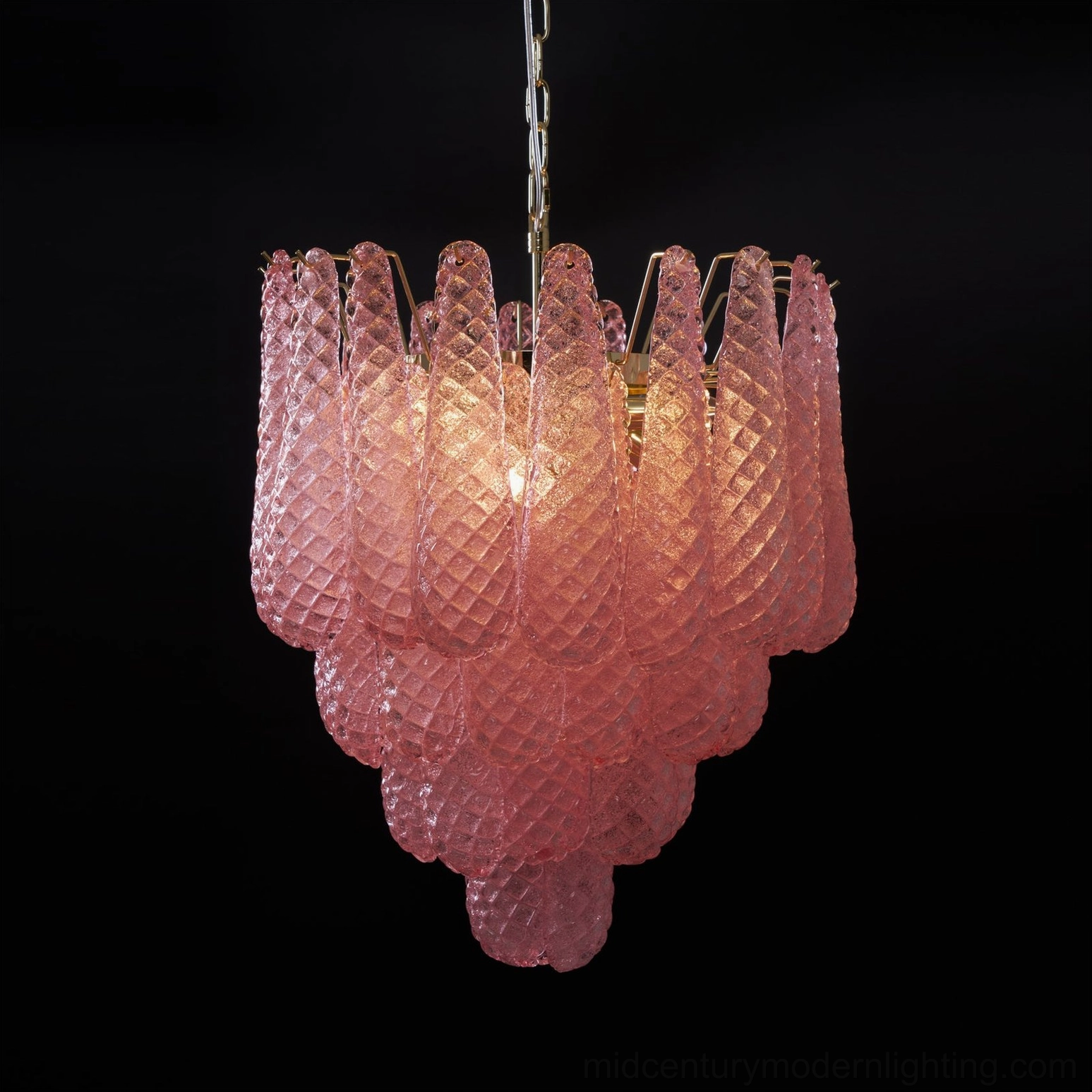 Hand-blown pink glass chandelier highlighting artisanal craftsmanship and Italian glassmaking