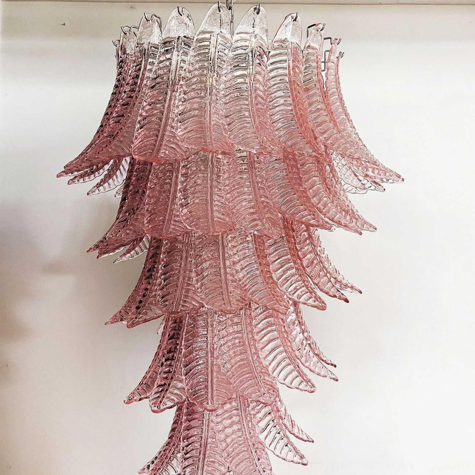 Asinara deep pink murano glass chandelier close-up layered ribbed glass leaves warm lighting