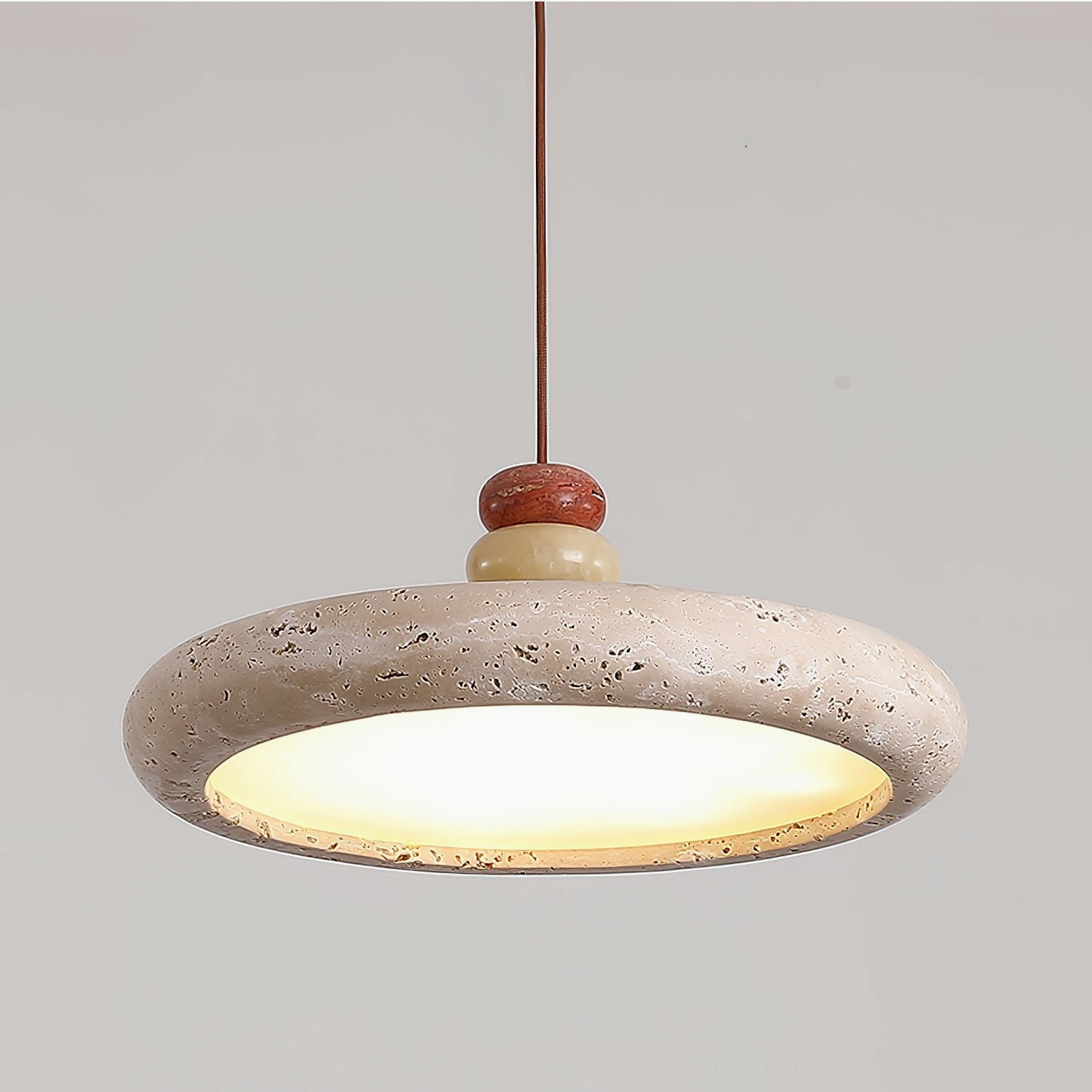 Model A travertine pendant light - medium size disc form in contemporary home setting