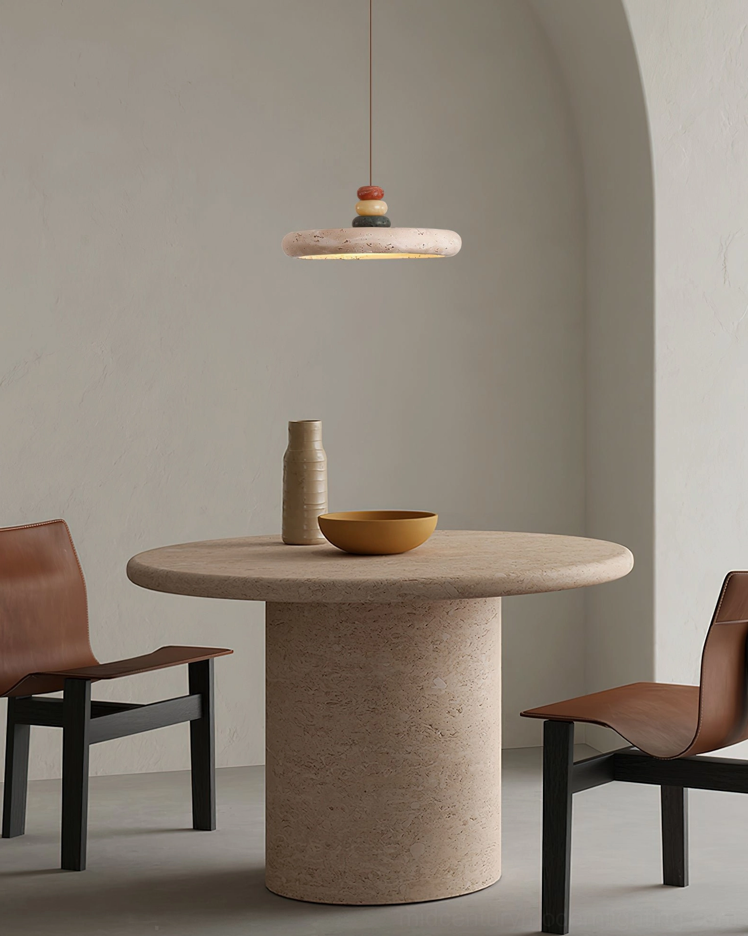 Sculptural disc travertine pendant lamp - three-quarter angle view showing architectural form