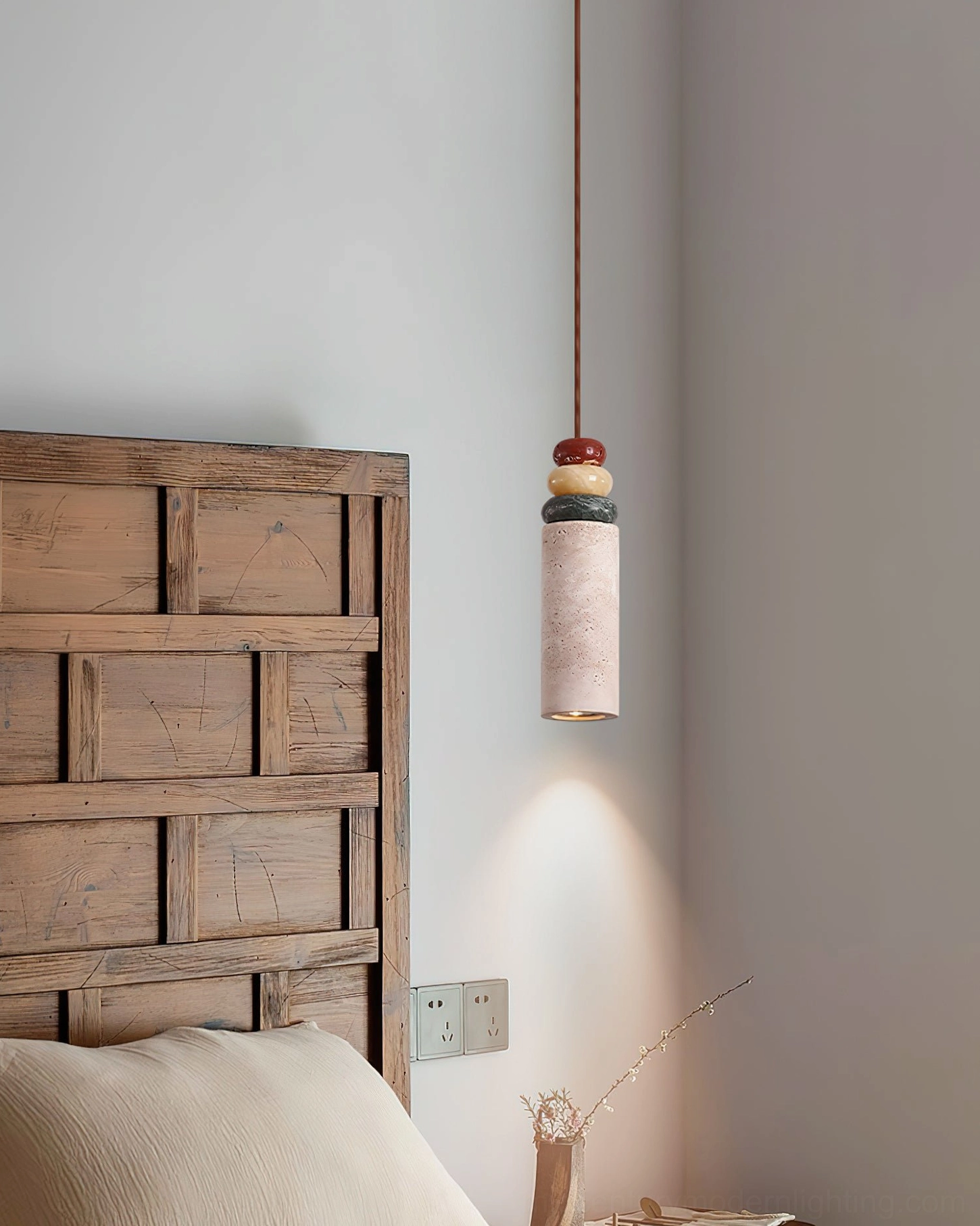 Aslo travertine pendant with colored stacked accents - detail view of natural stone texture and warm glow