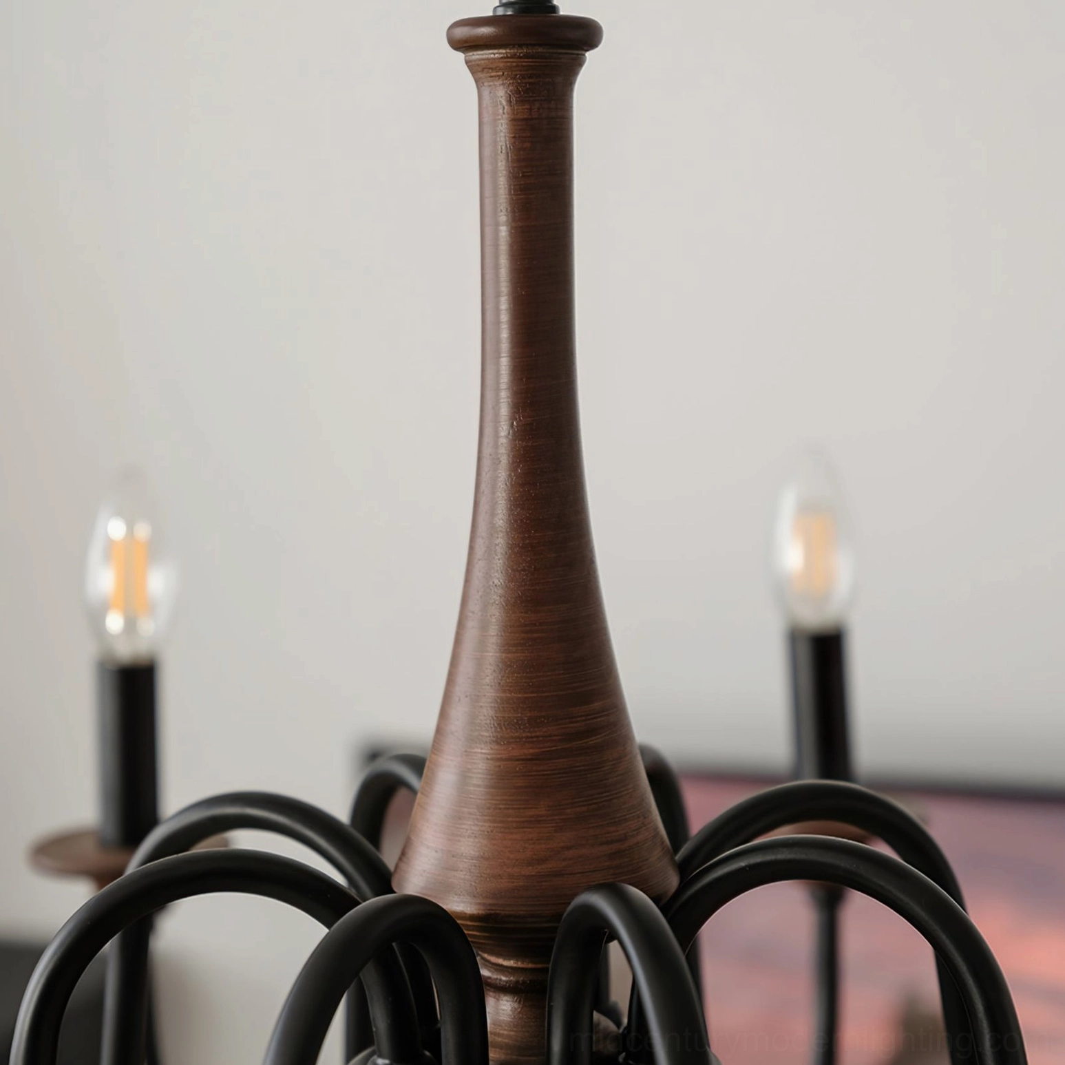 Aubrey chandelier wooden central column close-up with turned wood texture and warm brown walnut finish
