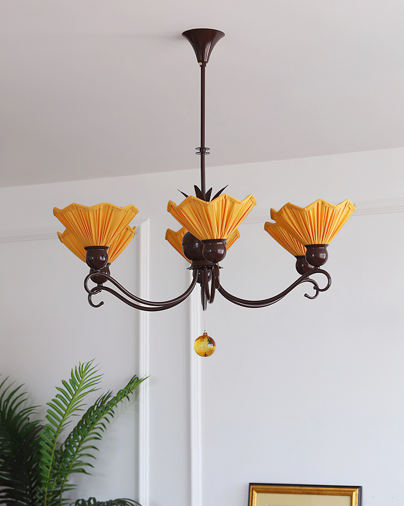 Aurelia 3-light pleated chandelier with floral-shaped amber pleated shades and modern aesthetic