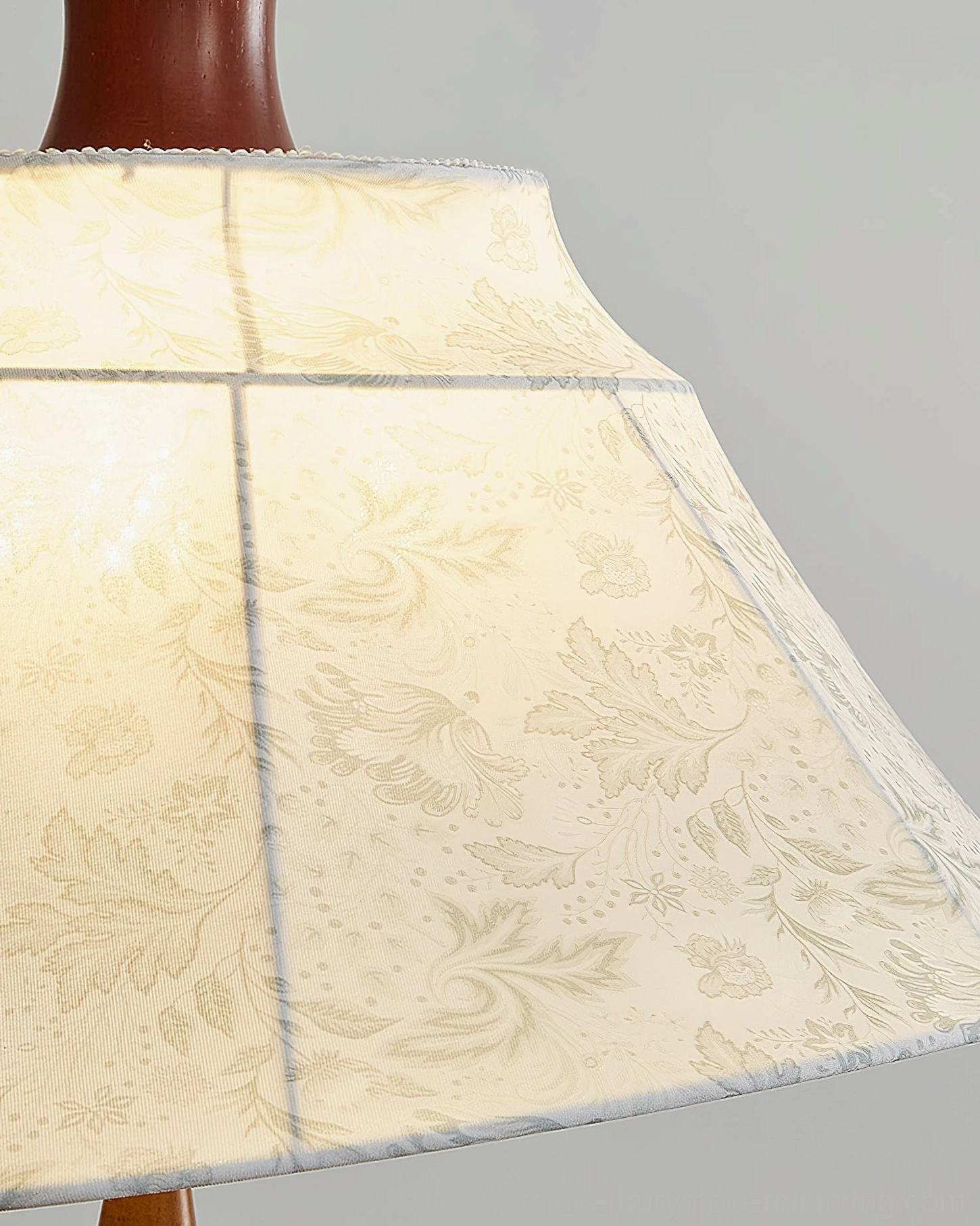 Close-up detail of Aurelian lamp shade showing floral printed fabric and stitched seam panels
