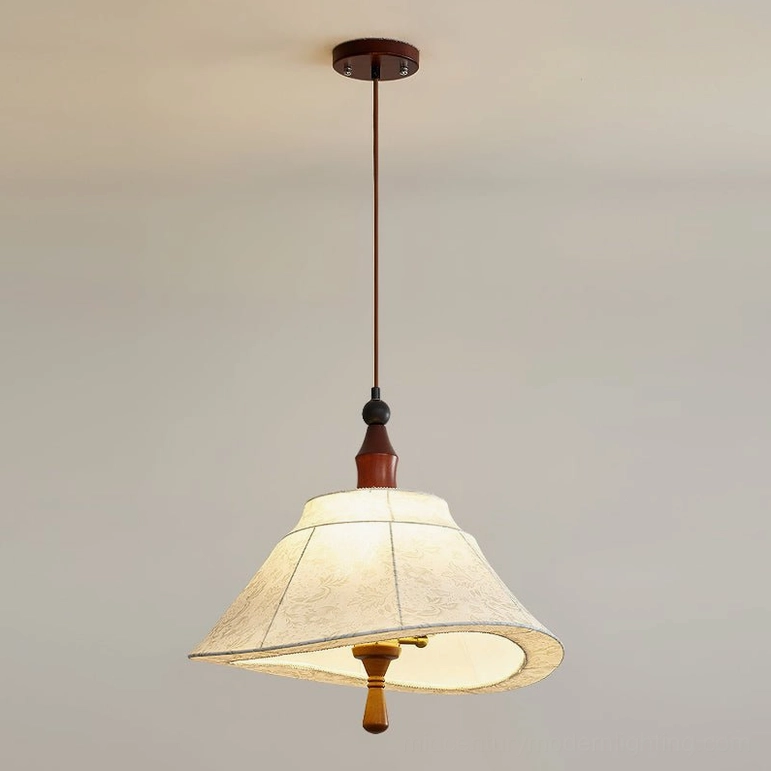 Aurelian mid-century modern pendant light with exposed brass base and warm ambient lighting against neutral wall