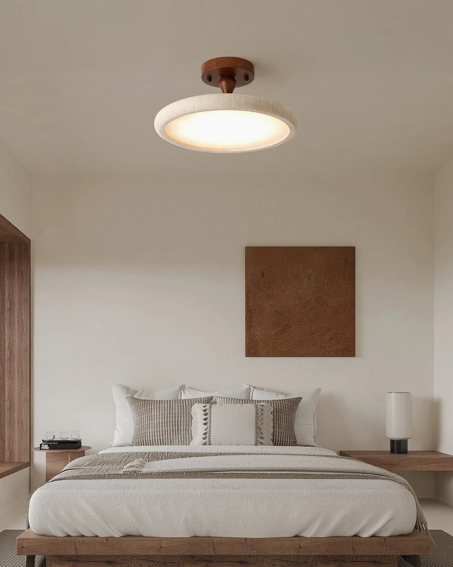 Bailey flush mount light in minimalist wabi-sabi bedroom with light wood furniture and square wall art