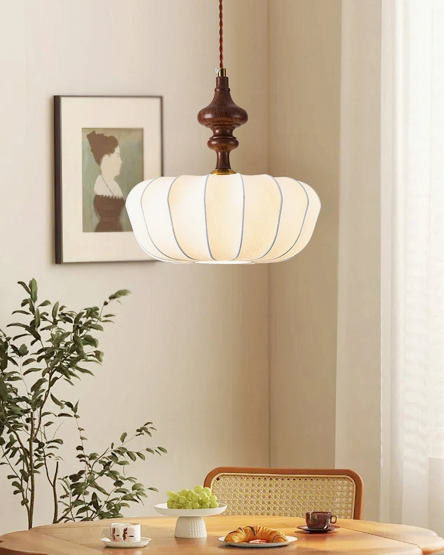 Baird pendant light installed in French country dining room with white ribbed shade and dark wood hardware