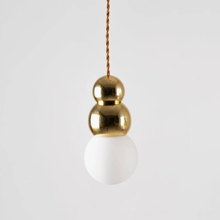 Ball pendant light in gold finish, polished metal frame with frosted glass globe modern style
