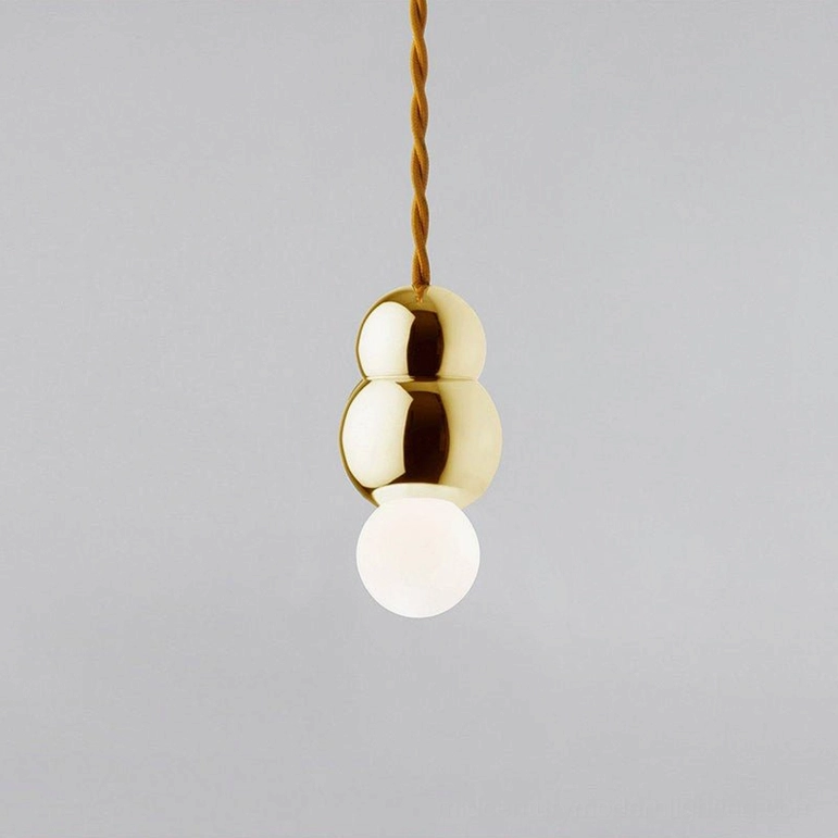 Ball pendant light multi-head configuration, clustered spheres creating focal point lighting effect