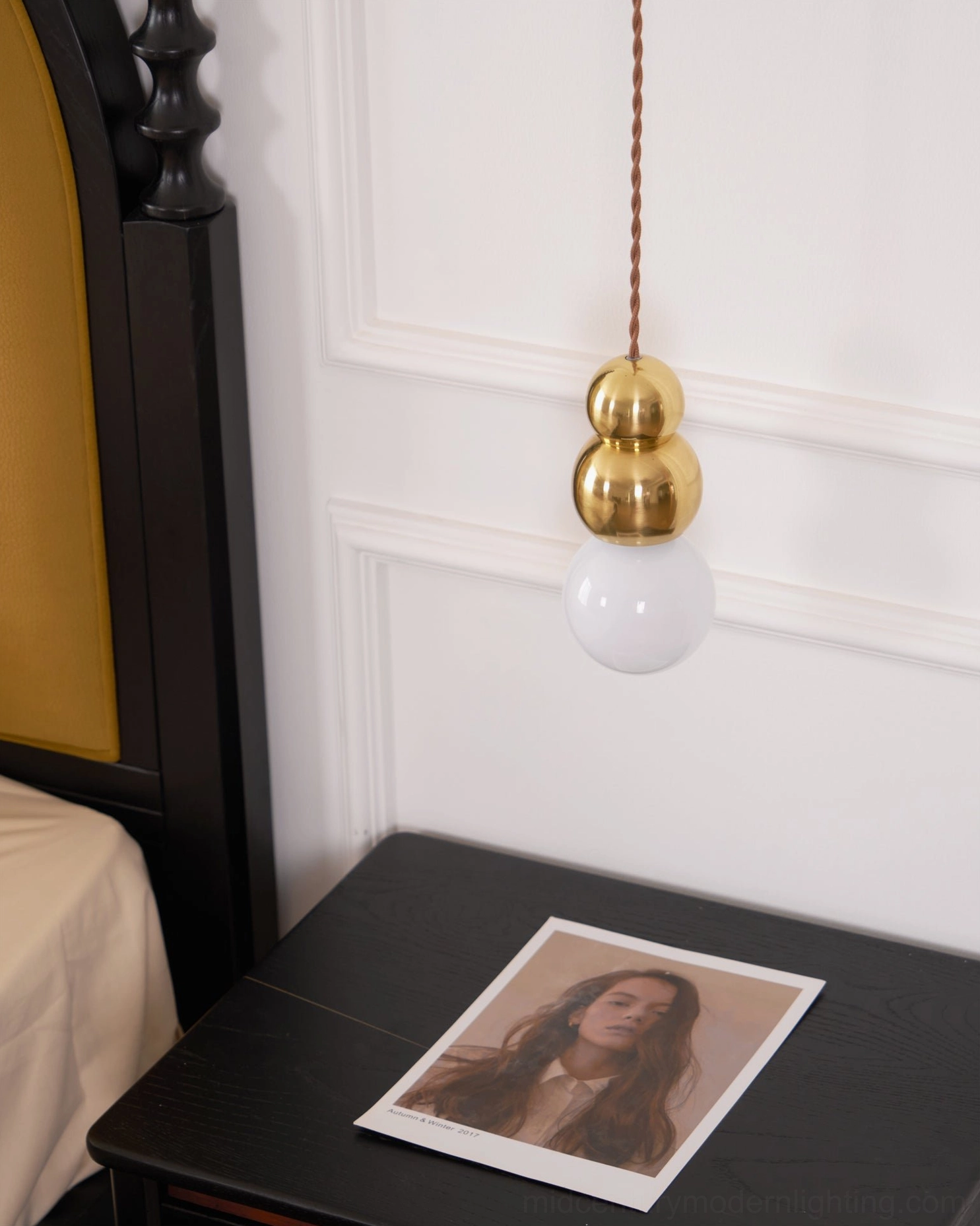 Ball series pendant light fixture, modern sculptural sphere design in contemporary interior setting