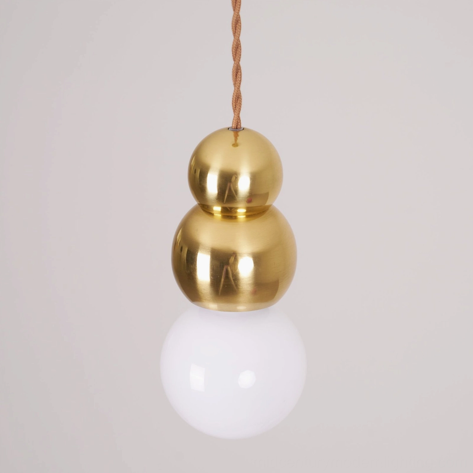 Ball series pendant light single fixture with frosted glass globe and metal suspension cord detail