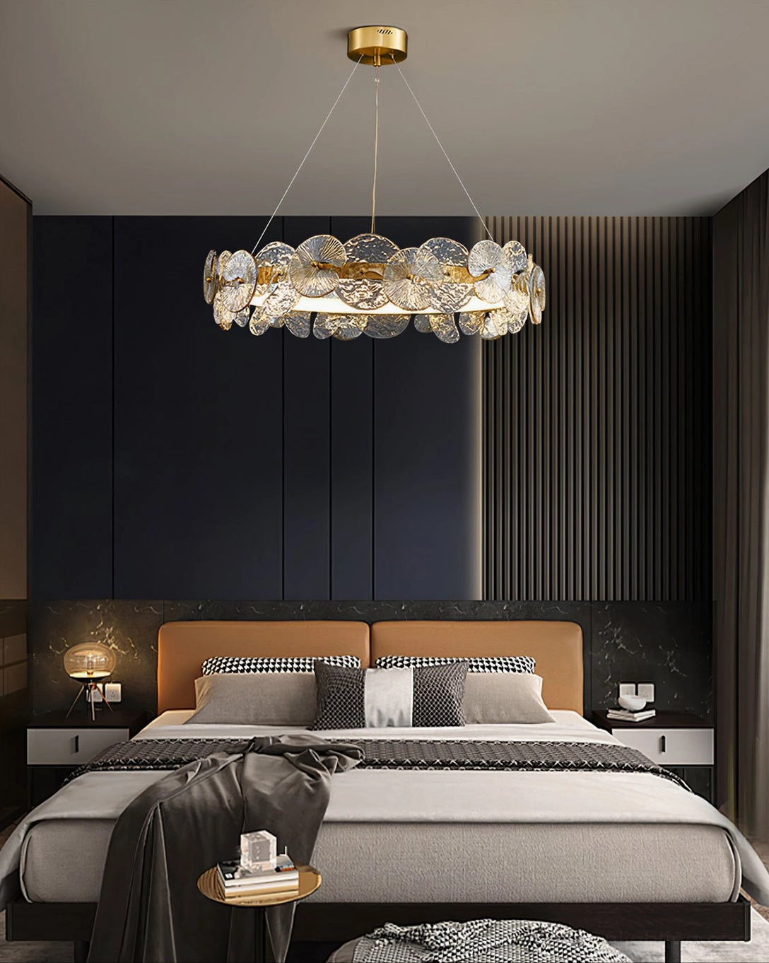 Barclay textured chandelier creating warm ambient lighting in master bedroom with dark accent walls