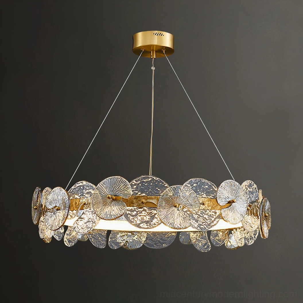 Overhead angle of Barclay chandelier displaying circular ring frame with textured glass flowers and brass accents