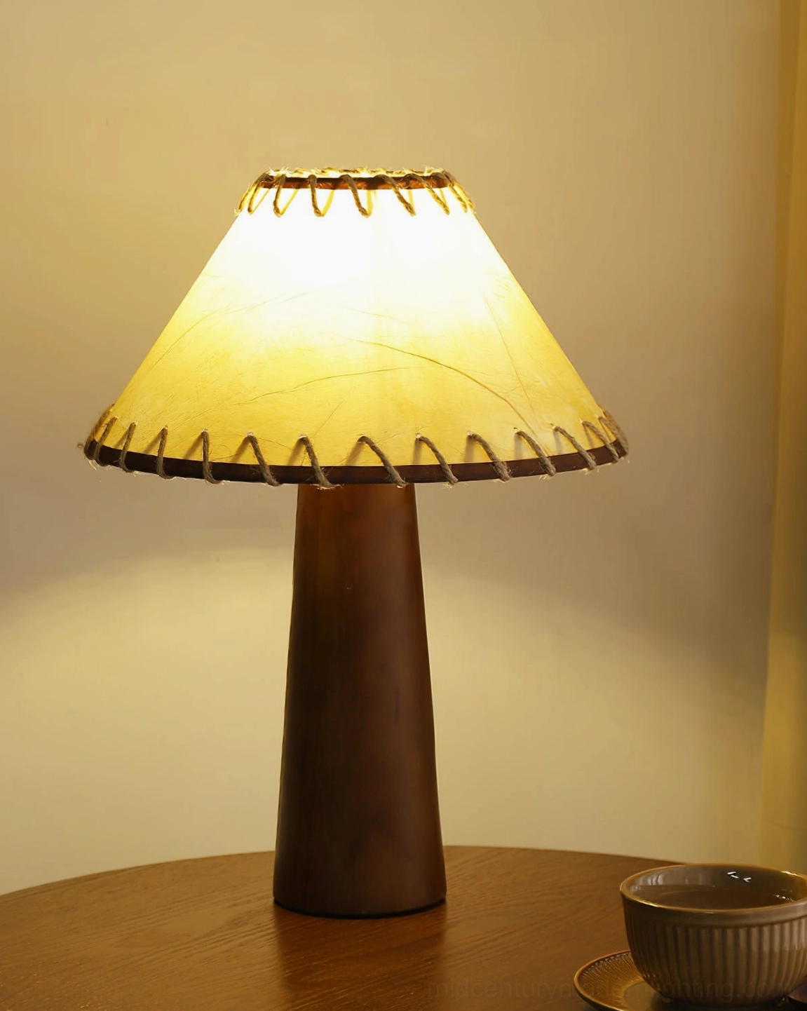Basica table lamp with push-button switch cord detail and fabric shade construction