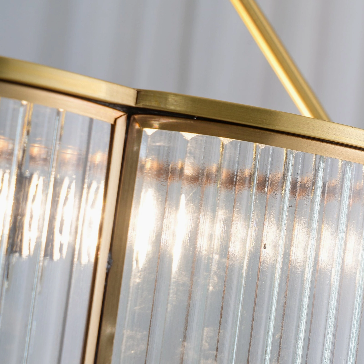 Basil quatrefoil chandelier ceiling detail showing brass rods and semi-flush mounting configuration