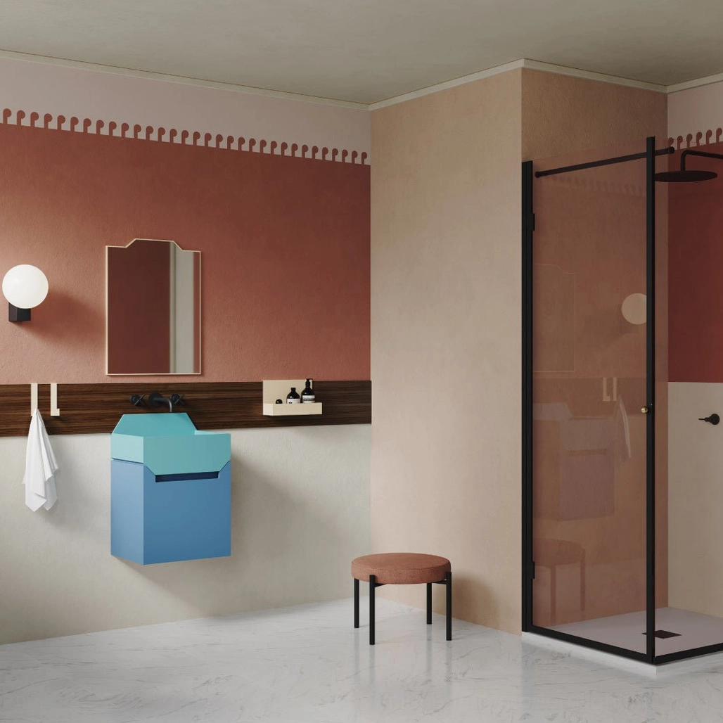 Minimalist frosted glass globe wall lamp in contemporary bathroom with matte black bracket and soft illumination
