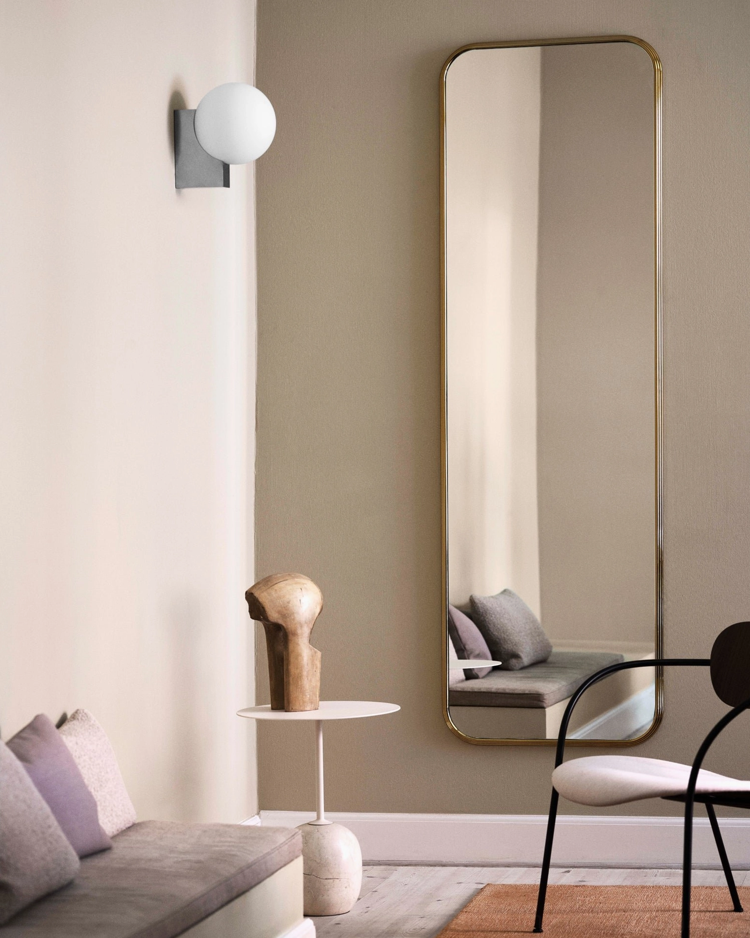 Modern sphere wall lamp with clean architectural form demonstrating Bauhaus-inspired design philosophy
