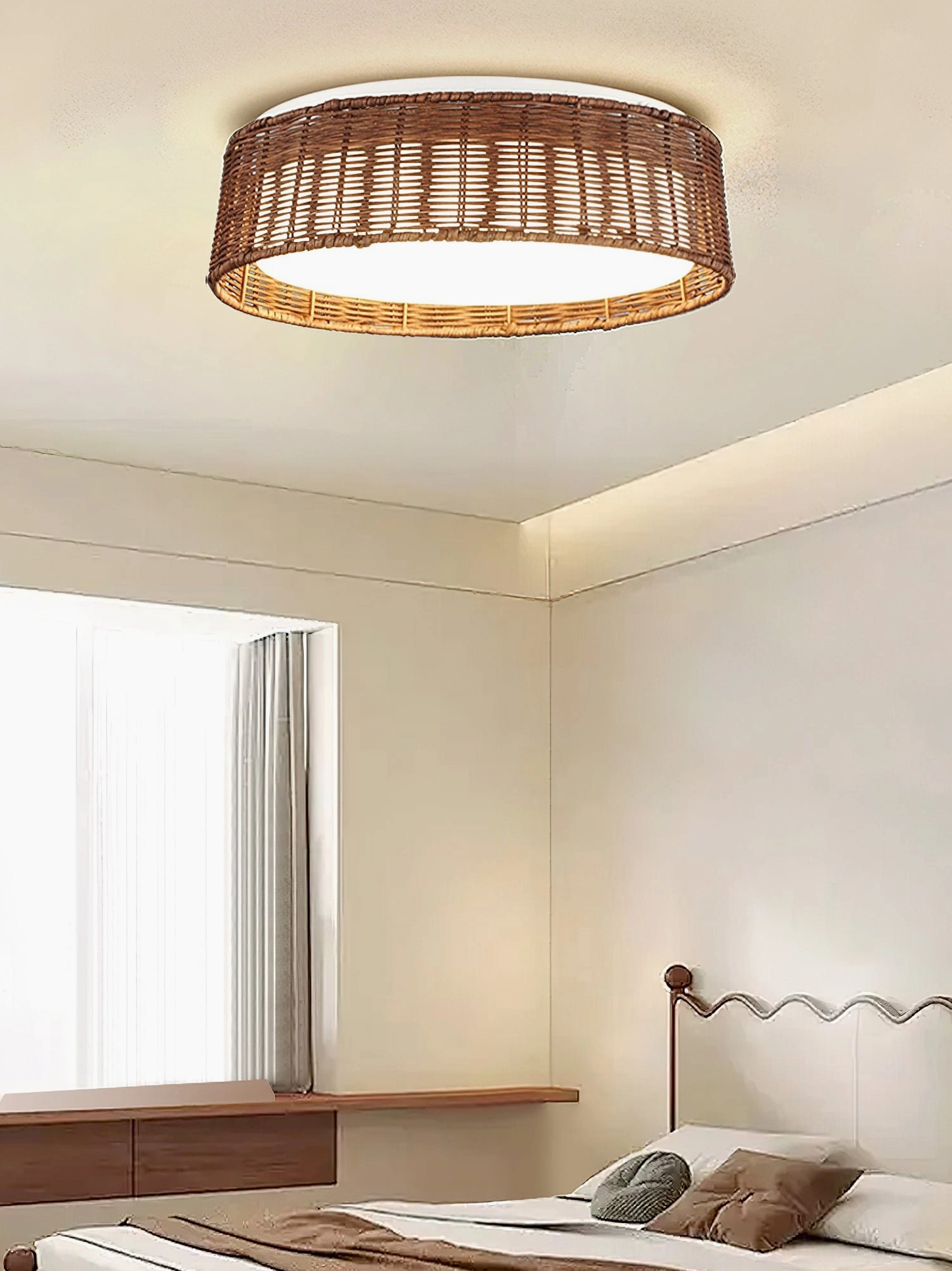 Bayou rattan ceiling light installed in modern bedroom interior, providing warm ambient lighting above bedside area with neutral décor