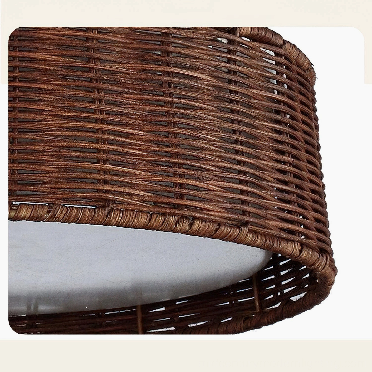 Extreme close-up detail shot of Bayou handwoven rattan weave pattern, highlighting natural material craftsmanship and texture