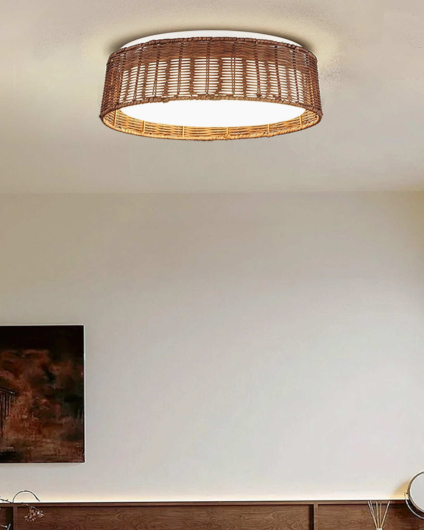 Bayou rattan ceiling light suspended in empty minimalist interior space, demonstrating sculptural bohemian design element