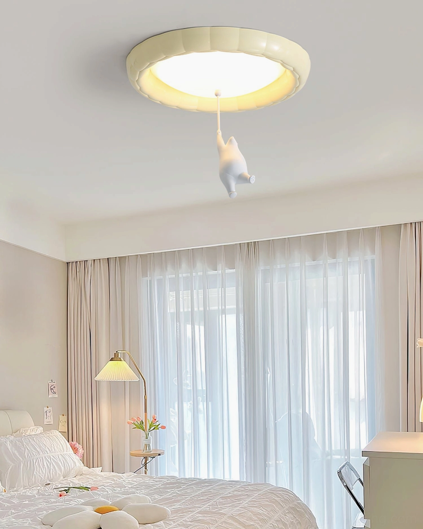 Little bear ceiling light installed in cozy warm-toned master bedroom with soft ambient illumination
