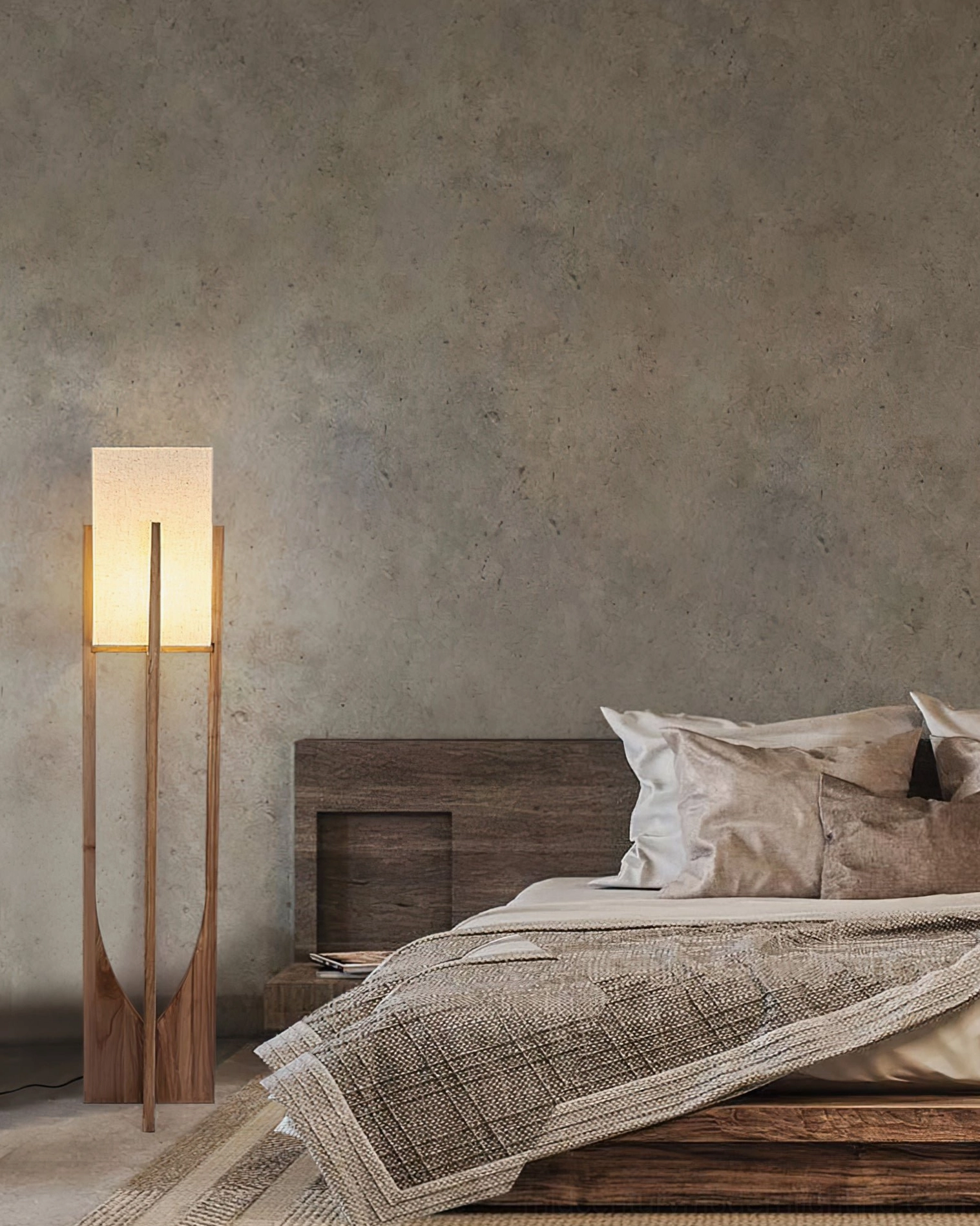 Cozy bedroom corner with floor lamp and linen bedding in rustic neutral decor style