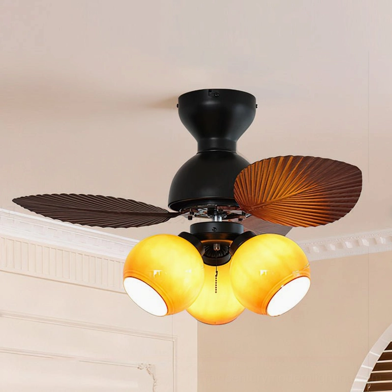 Belize tropical ceiling fan with caramel finish and palm-shaped blade design in warm bedroom environment