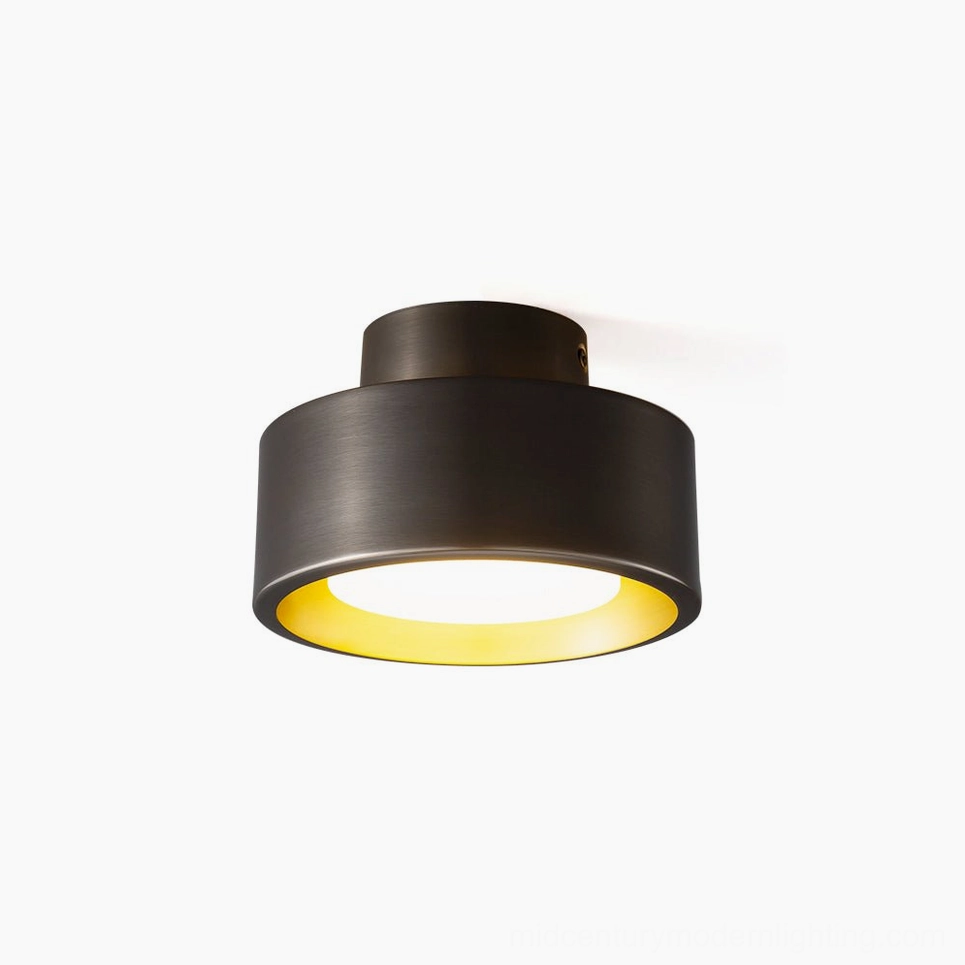 Bella flush mount ceiling light in brass and black metal finish shown front flat view against white background