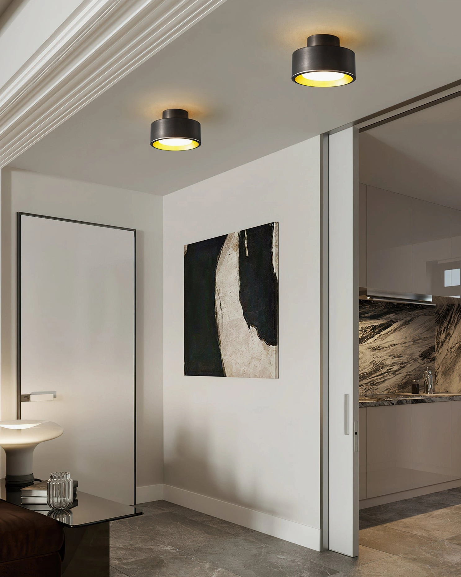 Two Bella flush mount ceiling lights installed in modern home entryway creating contemporary luxury ambiance