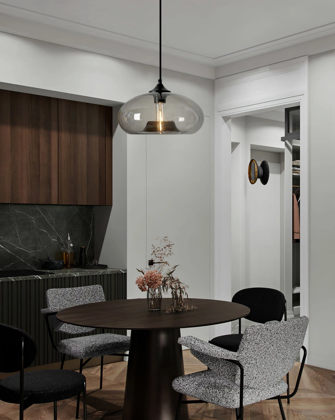 Single Bella glass pendant lamp in formal modern dining room setting with neutral tones and contemporary furniture