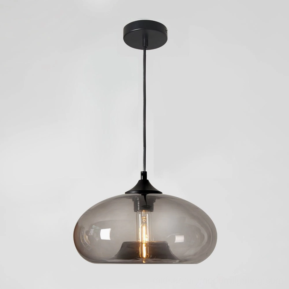 Bella hand-blown glass pendant with gray smoked shade in minimalist Scandinavian interior setting