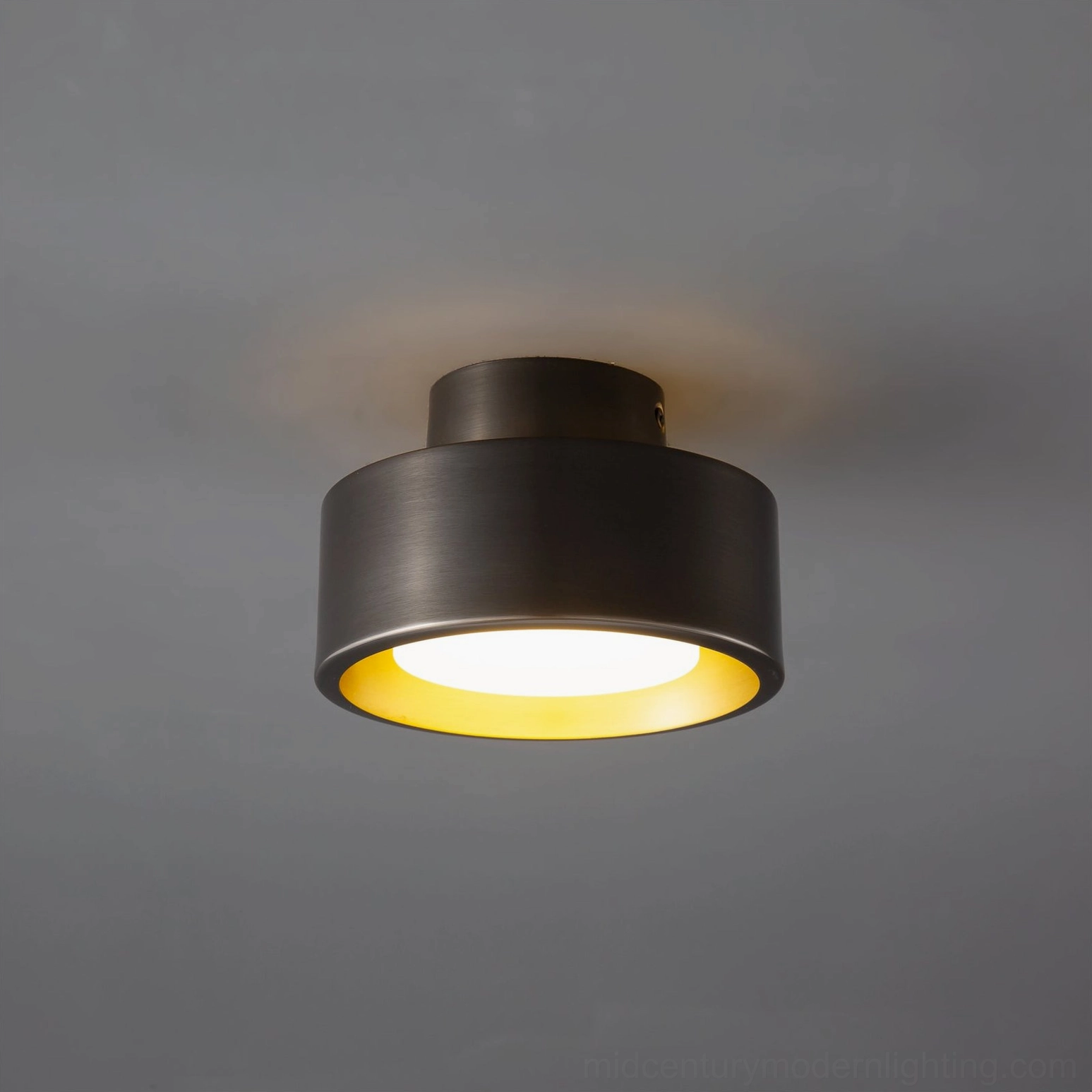 Bella flush mount ceiling lamp installation example in mid-century modern interior design setting