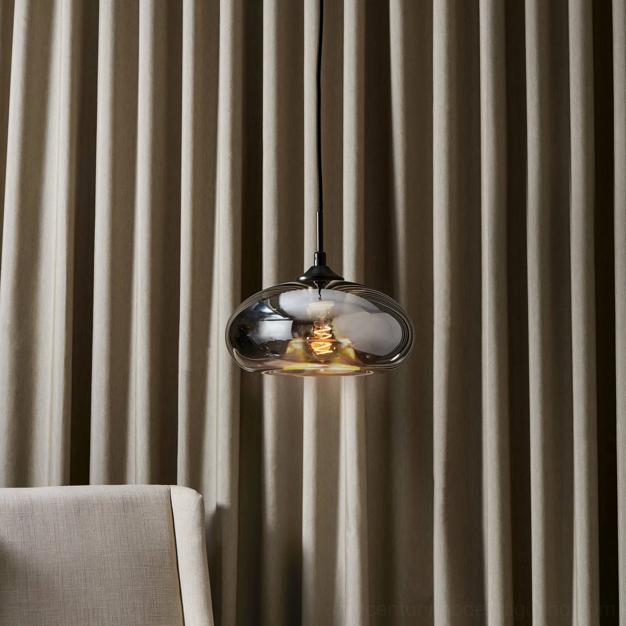 Bella glass pendant lighting showing glow quality and warm light diffusion through hand-blown shade