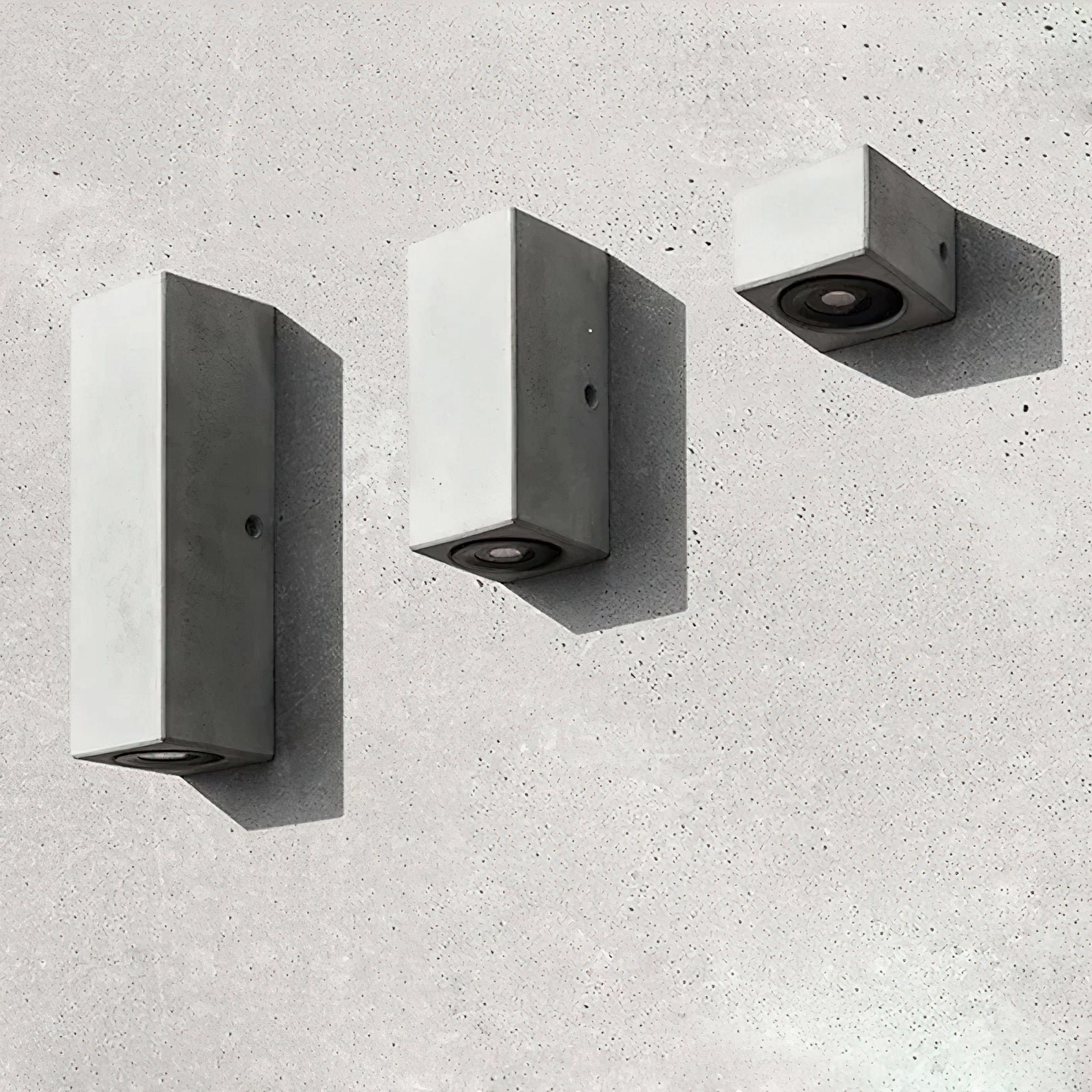 Bentu mixed concrete wall lamps flat lay overhead grey concrete backdrop rectangular square units