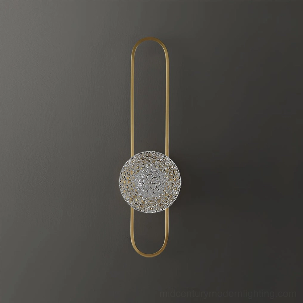 Bervalo mid-century modern wall sconce with gold brass frame and crystal dome shade
