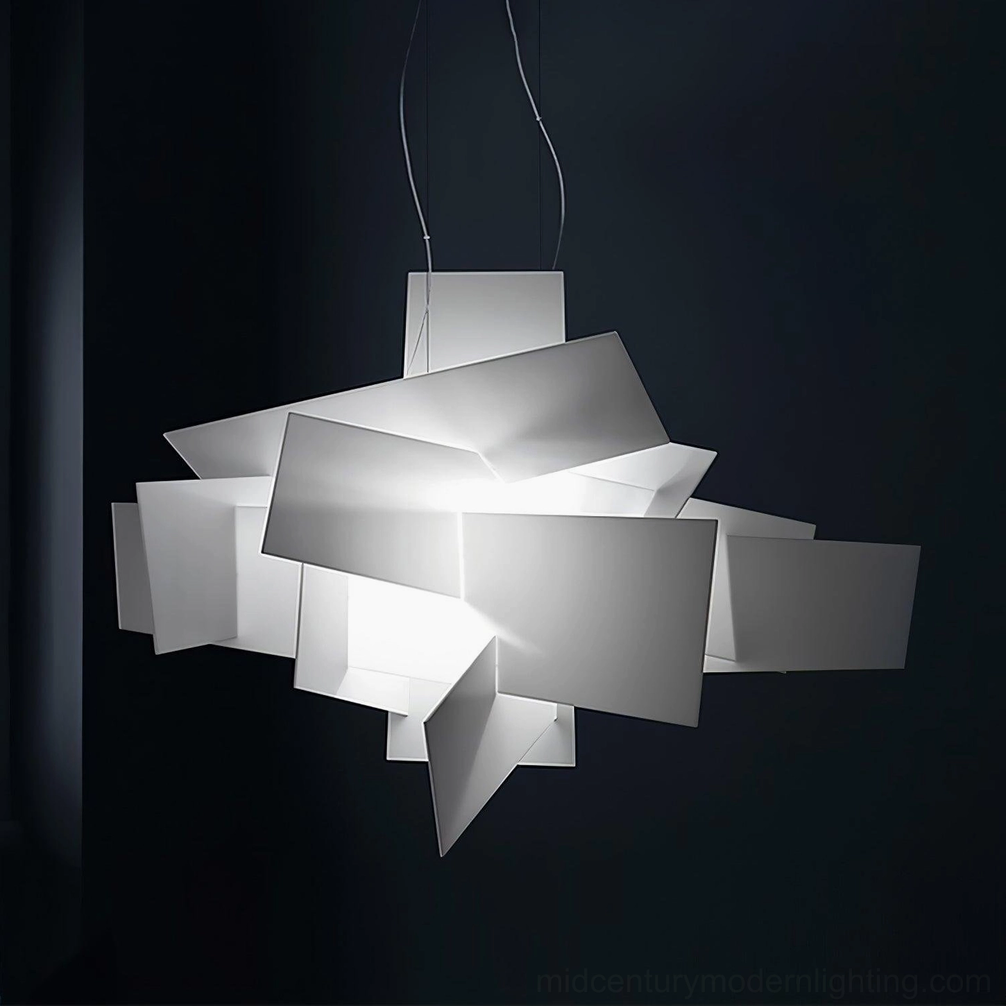 Big Bang illuminated geometric pendant glowing white acrylic planes low-angle dramatic lighting
