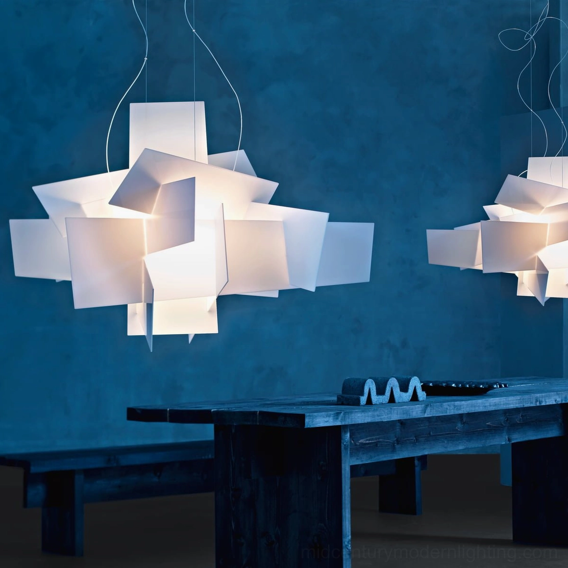 Big Bang dual pendant pair geometric lights deep blue accent wall warm suspended dining lights