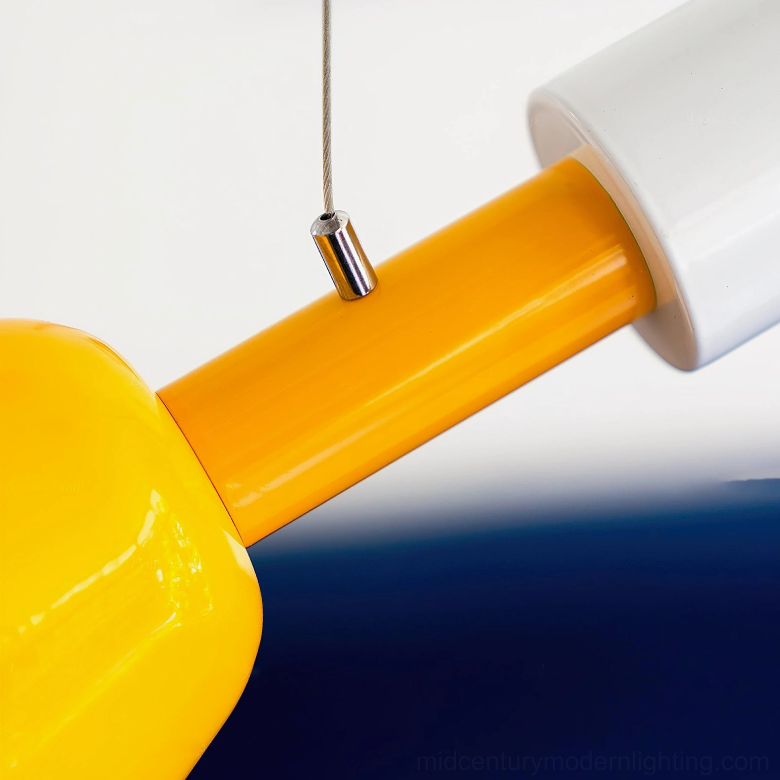 Billy pendant light hardware close-up - glossy painted surfaces and metal suspension components