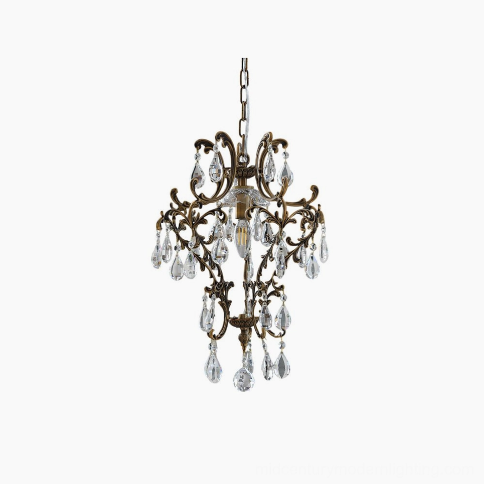 Antique birdcage crystal pendant light with ornate brass scrollwork and clear teardrop crystal drops, frontal overhead studio view
