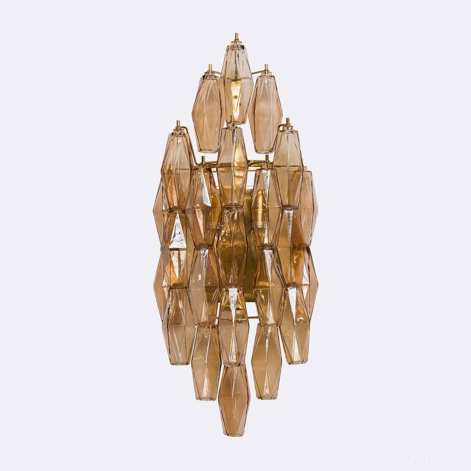 Polyhedral glass sconce geometric faceted design detail showing light refraction through colored glass